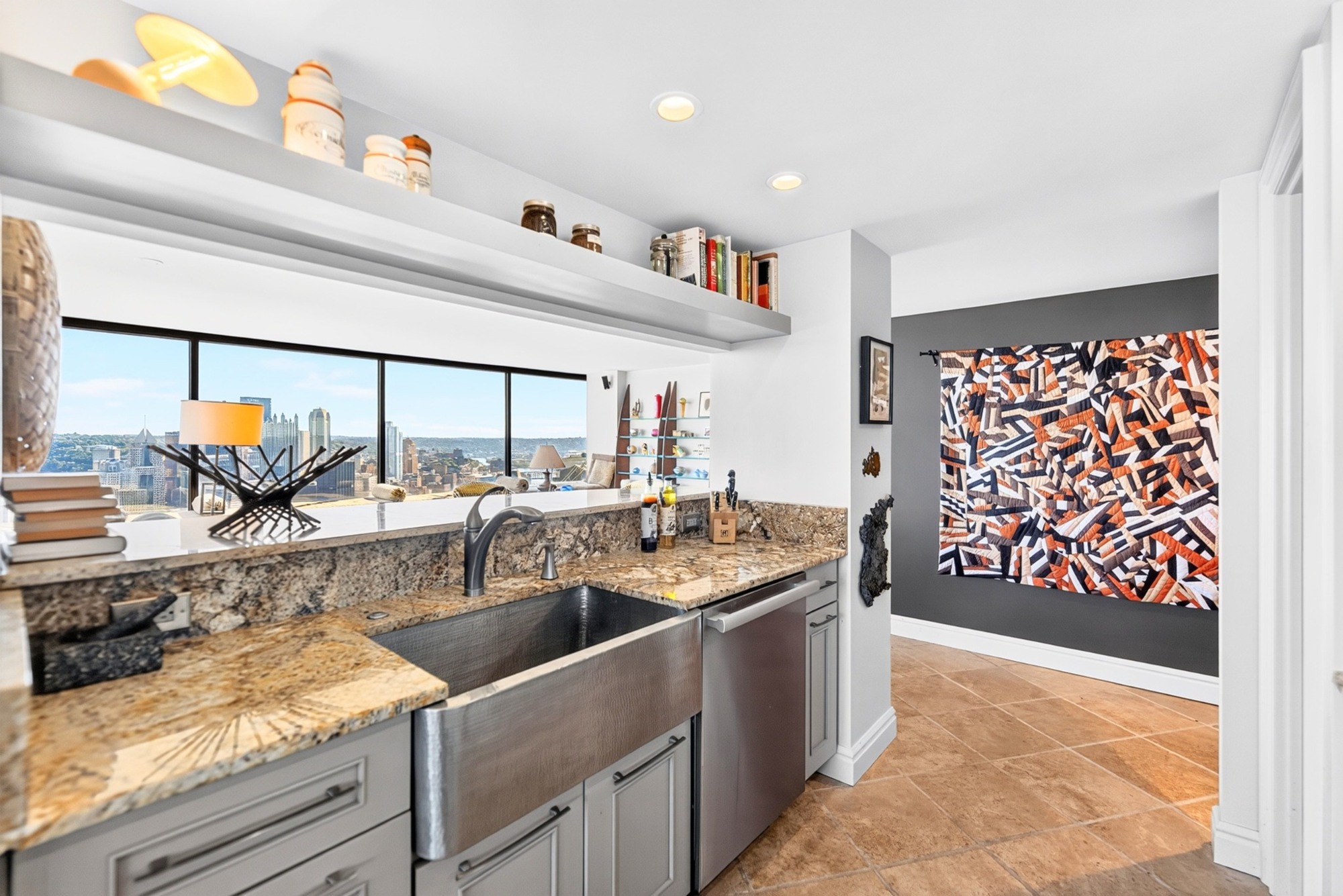 Granite counters and a farmhouse sink